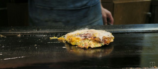 Cooking Okonomiyaki in Osaka